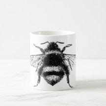 Manosee la taza de la abeja