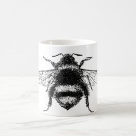 Manosee la taza de la abeja