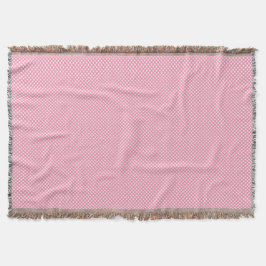 Manta A pink woven blanket with a subtle pattern 