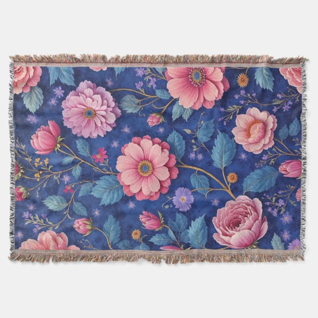 Manta Flores rosadas sobre un patrón azul vibrante (Anverso)