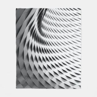 Manta Polar A curved facade covered in white latticework