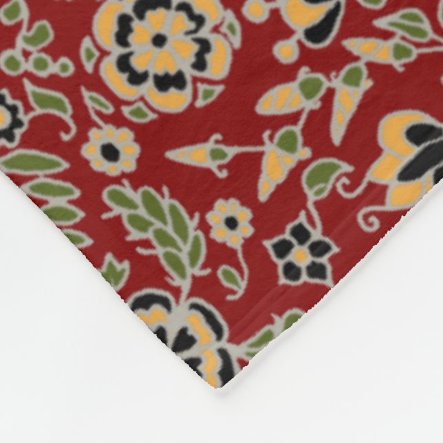 Manta Polar Amarillo, verde, negro sobre rojo profundo (Esquina)