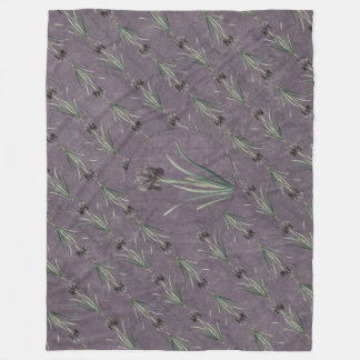 Manta Polar Black Iris on an antique tapestry