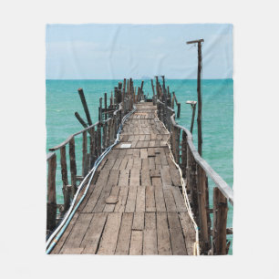 Manta Polar Bonito puente de madera con fondo de mar azul en S