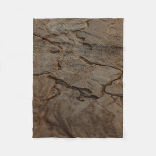 Manta Polar Brown and black wooden surface