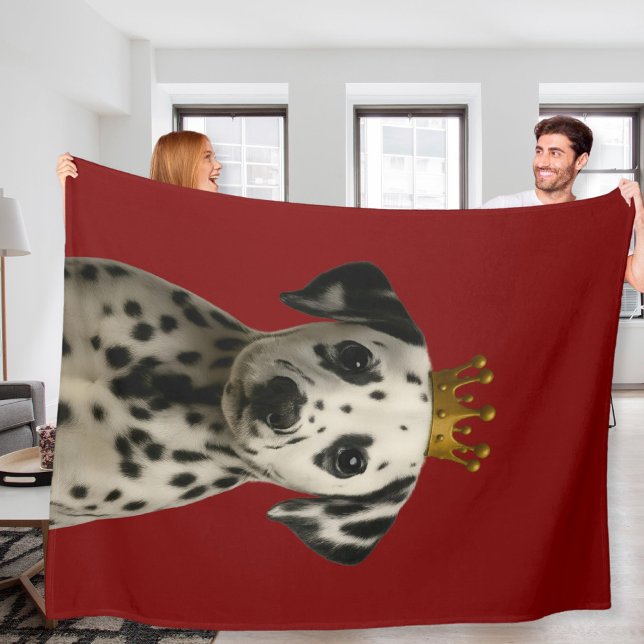 Manta Polar Cachorro dálmata en copa de oro (Dalmatian Puppy in Gold Crown Cute Fleece Blanket
by Ricaso. Dally pup on red throw blanket.)