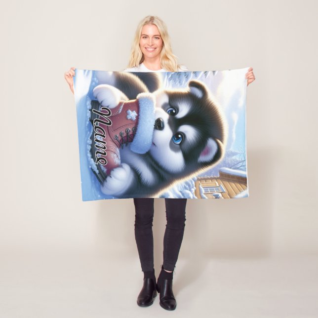 Manta Polar Cachorro jugando con un arranque de invierno cubie (In situ)