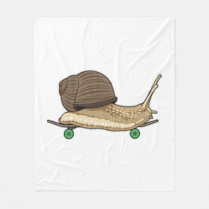 Manta Polar Caracol como patinador con patineta
