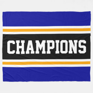 Manta Polar CHAMPIONS Atléticos Royal Azul Negro Naranja Rayas