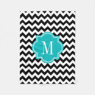 Manta Polar Chevron blanco y negro con el monograma verde
