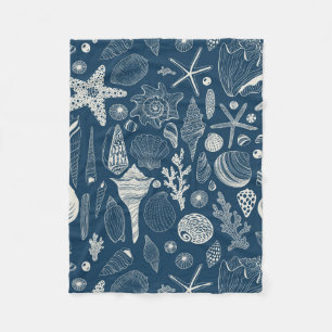 Manta Polar Conchas marinas sobre azul oscuro