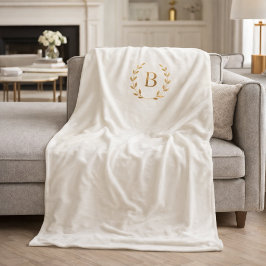 Manta Polar Corona elegante con monograma en oro marfil
