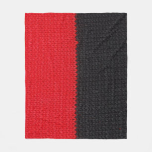 Manta Polar Cuchillo rojo negro: cierre a rayas.