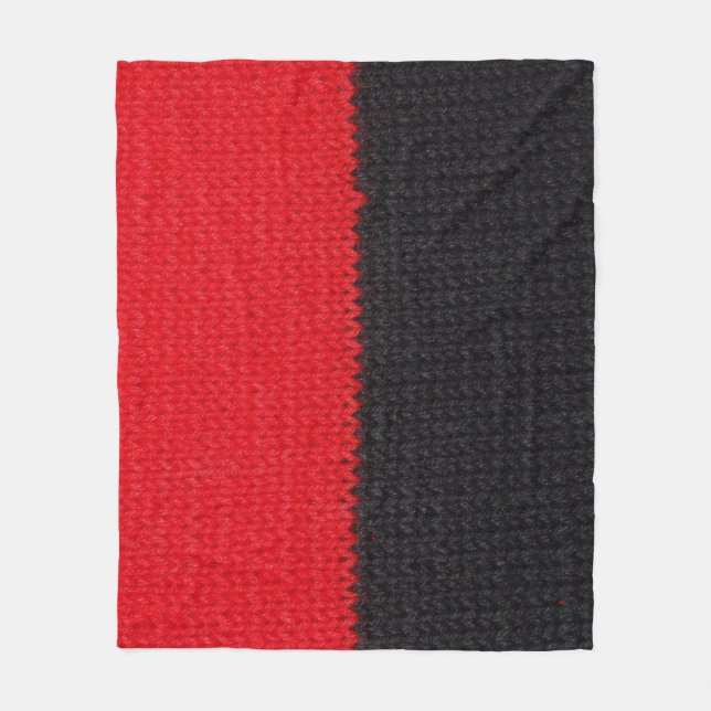 Manta Polar Cuchillo rojo negro: cierre a rayas. (Anverso)