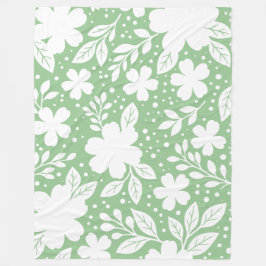 Manta Polar Diseño floral blanco sobre fondo verde suave