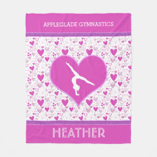 Manta Polar El rosa con monograma sortea la gimnasia de los