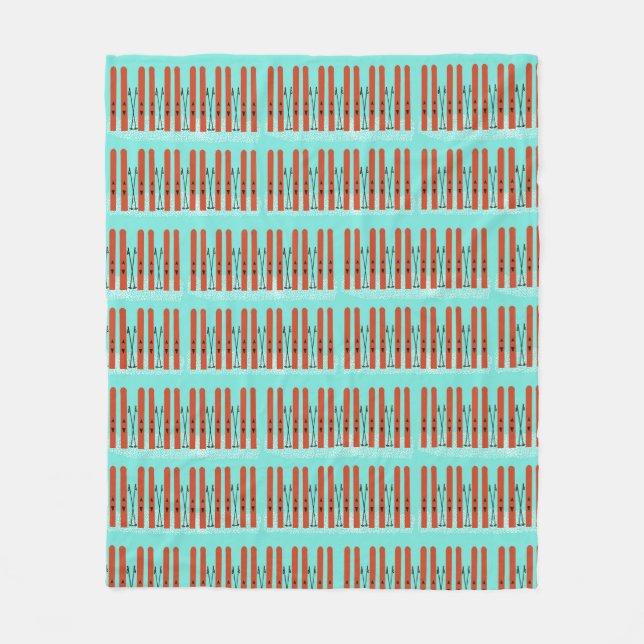 Manta Polar Esquíes rojos sobre fondo azul (Anverso)