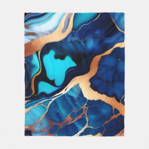 Manta Polar Flamante dorado azul trenzado