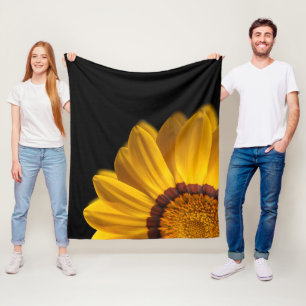 Manta Polar Flor amarilla sobre fondo negro