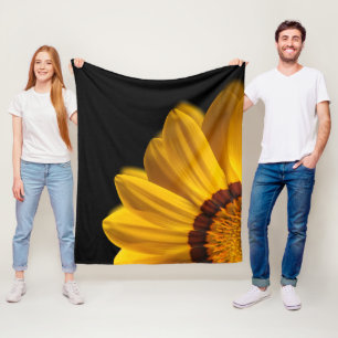 Manta Polar Flor amarilla sobre fondo negro