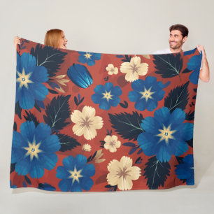 Manta Polar Floral azul audaz y crema en fondo rojo