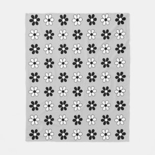 Manta Polar Flores modernas en blanco y negro sobre gris plate