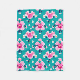 Manta Polar Flores rosadas y hojas sobre fondo azul turquesa