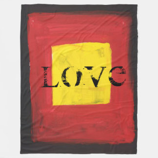 Manta Polar Funda negra, roja y amarilla.