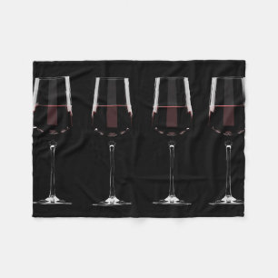 Manta Polar Gafas de vino con vino tinto en negro
