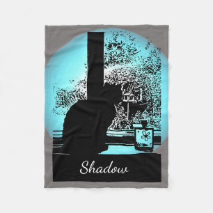 Manta Polar Gato negro en ventana