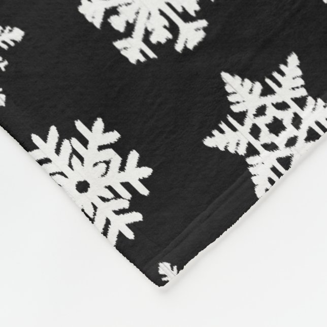 Manta Polar Ikat Snowflakes - Blanco y negro (Esquina)