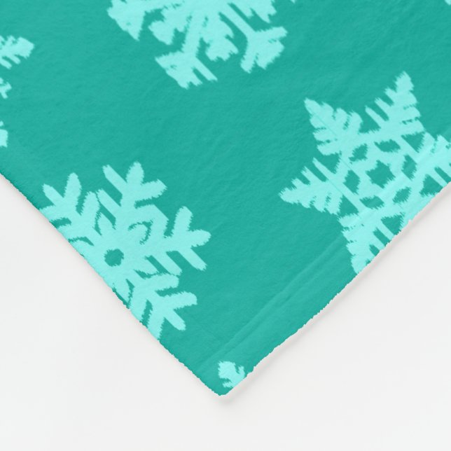 Manta Polar Ikat Snowflakes - Turquesa y aqua (Esquina)