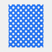 Los puntos de polka blanco sobre el azul real