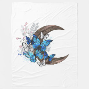 Manta Polar Mariposas azules sobre la media luna de madera