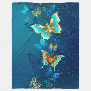 Manta Polar Mariposas doradas sobre fondo azul