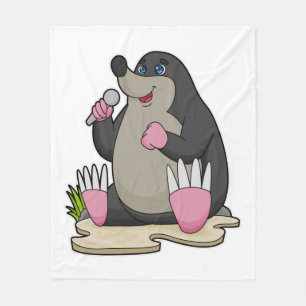 Manta Polar Mole como cantante con micrófono