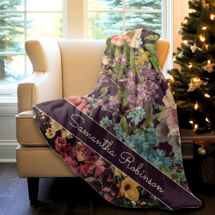 Manta Polar Monograma de patrón negro floral púrpura ventilado