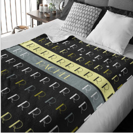 Manta Polar Monograma replicado a rayas Guay en negro