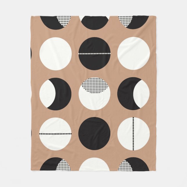 Manta Polar Negro, círculos blancos, fondo marrón. (Anverso)