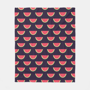 Manta Polar Neon Watermelon sobre el patrón púrpura