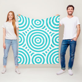Manta Polar Patrón circular de color turquesa y anidado blanco