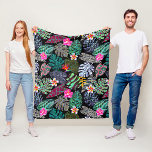 Manta Polar Patrón de hojas y flores tropicales vibrantes