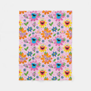 Manta Polar Patrón floral rosado de Plaza Sésamo