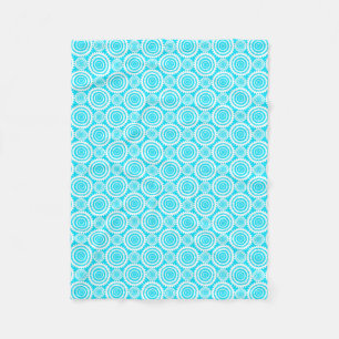 Manta Polar Patrón geométrico luminoso turquesa y blanco diver