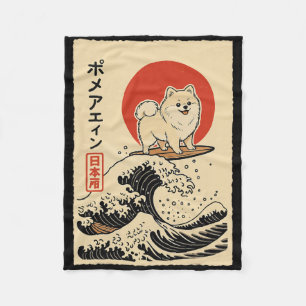 Manta Polar Pomerania surfeando ola japonesa
