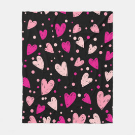 Manta Polar Rosa sobre corazones negros
