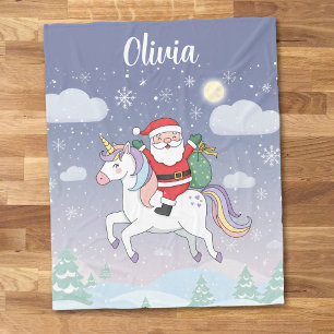 Manta Polar Santa montando un unicornio mágico de Navidad