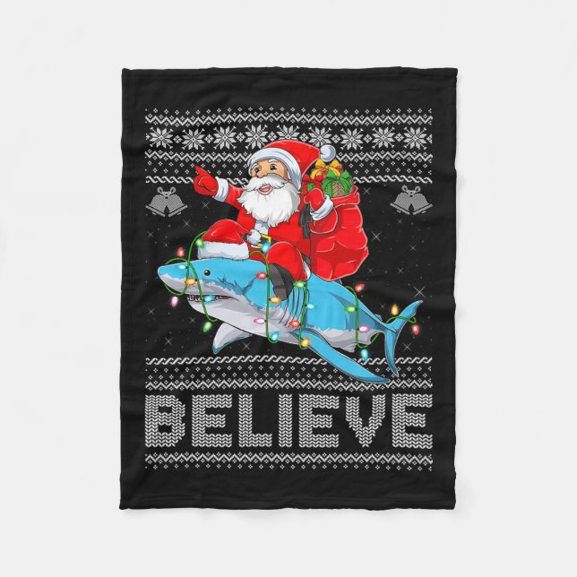 Manta Polar Santa Riding Shark Ugly Christmas Sweater Believe  (Anverso)