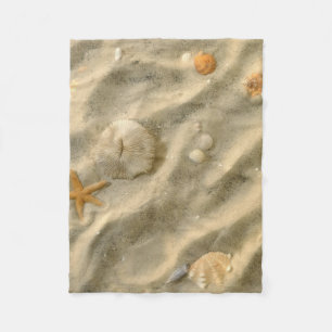 Manta Polar Seashells en arena