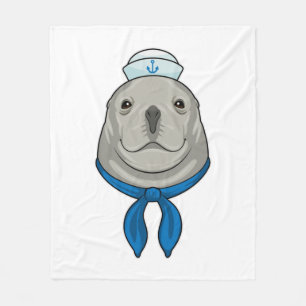 Manta Polar Sello como marinero con gorra de marinero